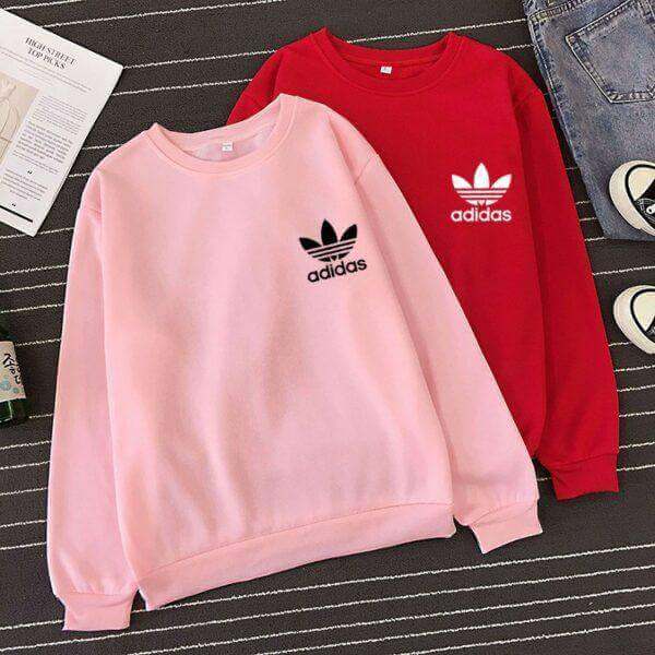 Дамска блуза Adidas https://satmoda.com/products/adidas спортна-дамска-блуза Модерна дамска блуза с надпис БЛУЗА с обло деколте и свободна кройка. Материята на блузата е изключително мека и приятна. Осигурява максимален комфорт и топлина през зимните дни. 100% памук
