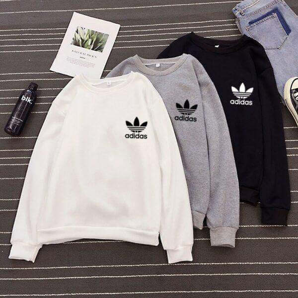 Дамска блуза Adidas https://satmoda.com/products/adidas спортна-дамска-блуза Модерна дамска блуза с надпис БЛУЗА с обло деколте и свободна кройка. Материята на блузата е изключително мека и приятна. Осигурява максимален комфорт и топлина през зимните дни. 100% памук
